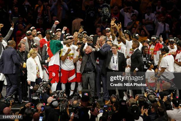 Chairman of MLSE, Larry Tanenbaum celebrates on stage with the Larry O'Brien Trophy and the Toronto Raptors after winning Game Six of the NBA Finals...