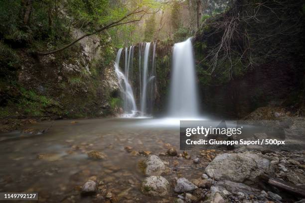 the valley of dreams - rainbow waterfall stock pictures, royalty-free photos & images