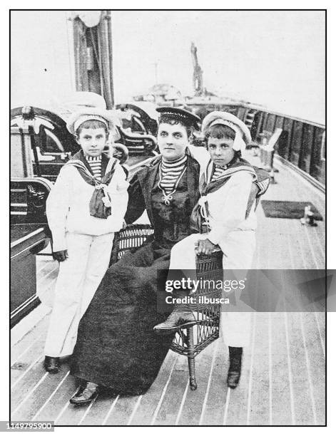 antique photo: mother and sons on ship - vintage sailor stock illustrations