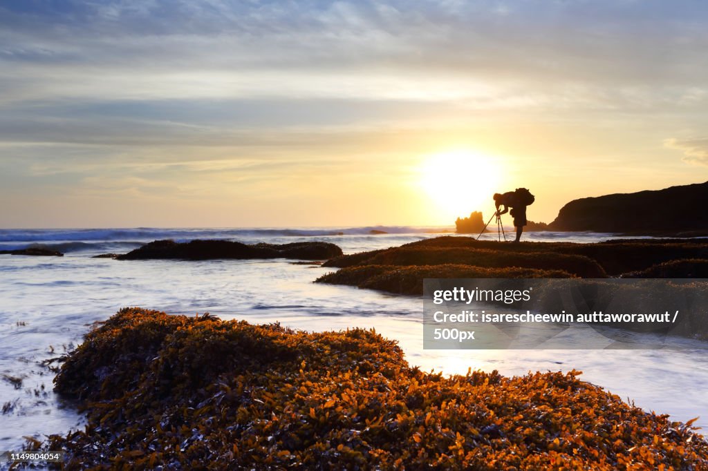The Melasti Beach At Sunset In Bali Indonesia