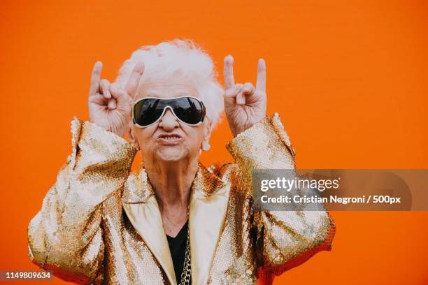 grandmother portraits on colored backgrounds - crazy party ストックフォトと画像