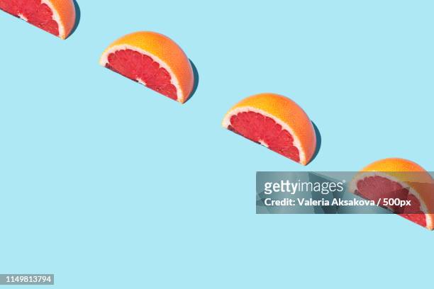 food fashion food pattern with grapefruits - fashion food stock pictures, royalty-free photos & images