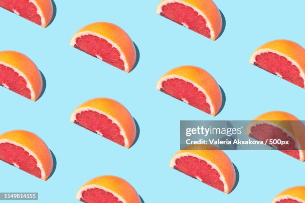 food fashion food pattern with grapefruits - citrus fruit background stock pictures, royalty-free photos & images