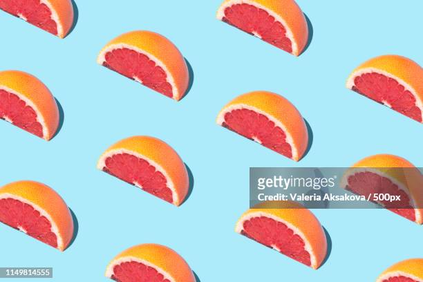 food fashion food pattern with grapefruits - grapefruit bildbanksfoton och bilder