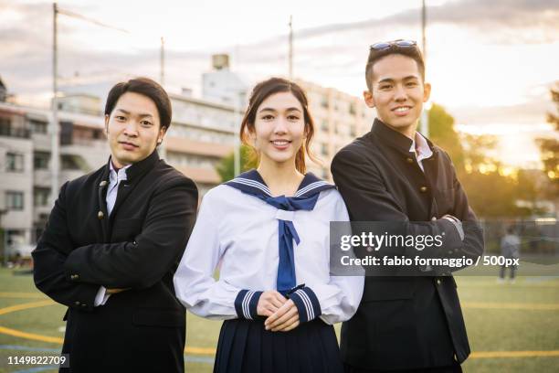 Japanese Students Meeting Outdoors High-Res Stock Photo