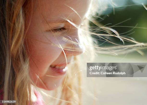 young girl stands in sunshine - rudolph stock pictures, royalty-free photos & images