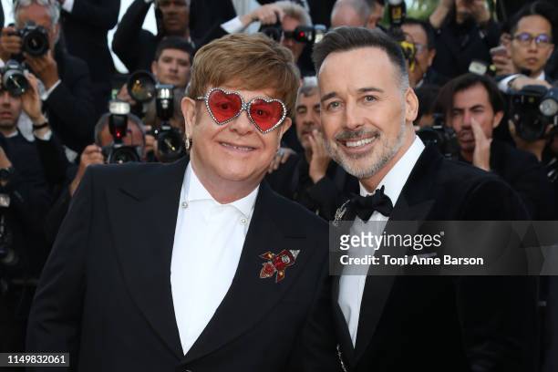 Elton John and David Furnish attend the screening of "Rocket Man" during the 72nd annual Cannes Film Festival on May 16, 2019 in Cannes, France.