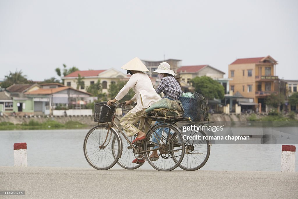 Two women on bicycle