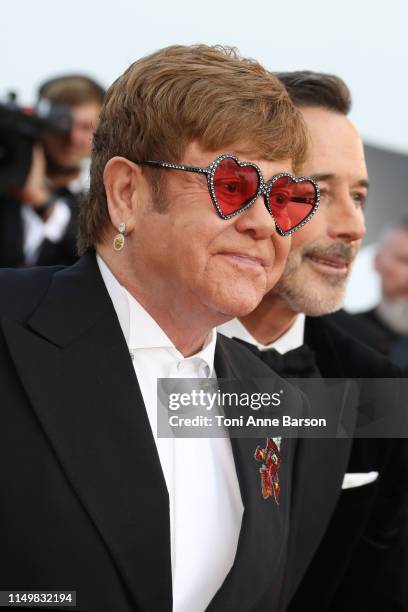 Elton John and David Furnish attend the screening of "Rocket Man" during the 72nd annual Cannes Film Festival on May 16, 2019 in Cannes, France.