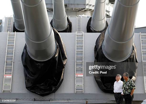 Secretary of Defense Robert Gates tours the USS Missouri battleship with Mike Carr, President of The USS Missouri memorial during Gates' visit on May...