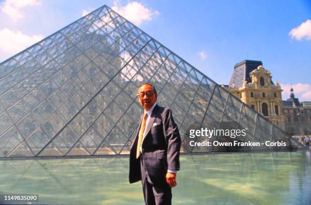 Portrait of Chinese-American architect IM Pei as he poses in front of his work, Pyramide du Louvre, outside the Louvre Museum, Paris, France, May 17,...