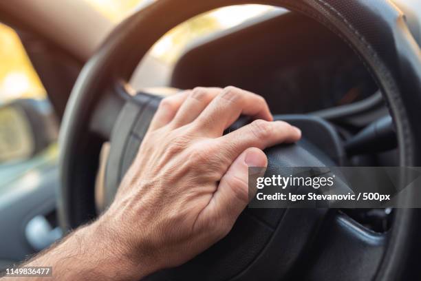 nervous driver pushing car horn - horn press stock pictures, royalty-free photos & images