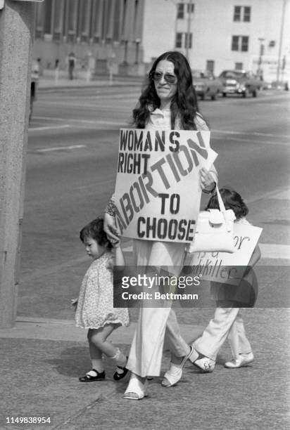 Three generations apart but together on their stand on abortion, Adelle Thomas her daughter, Marie Higgins and her daughter, Catherine Starr join in...