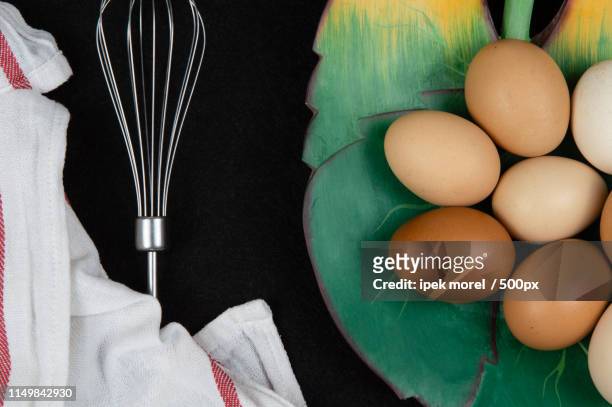 chicken eggs and eggbeater - ipek morel stock pictures, royalty-free photos & images