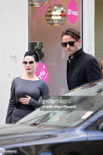 Dita von Teese and her boyfriend Louis-Marie de Castelbajac are sighted on 'Rue Saint Honore' on May 31, 2011 in Paris, France.