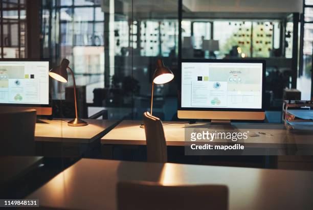this is what you call a productive space - computer screen on desk stock pictures, royalty-free photos & images