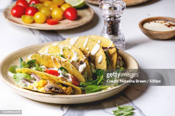 vegetarian corn tacos - mexican food background stock pictures, royalty-free photos & images