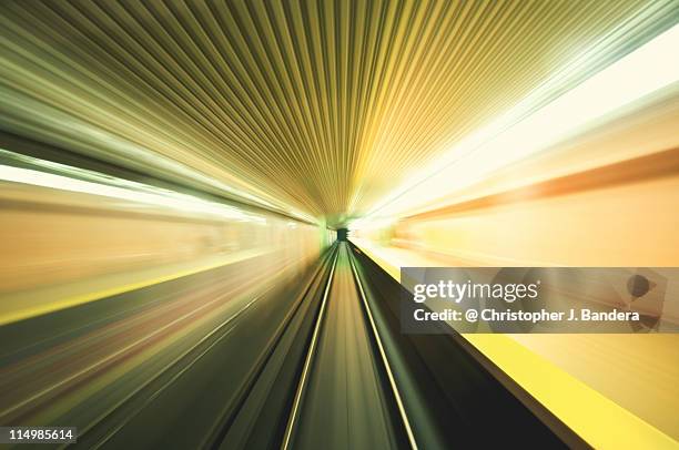 subway leaving st. patrick station. - pedestrian tunnel stock pictures, royalty-free photos & images