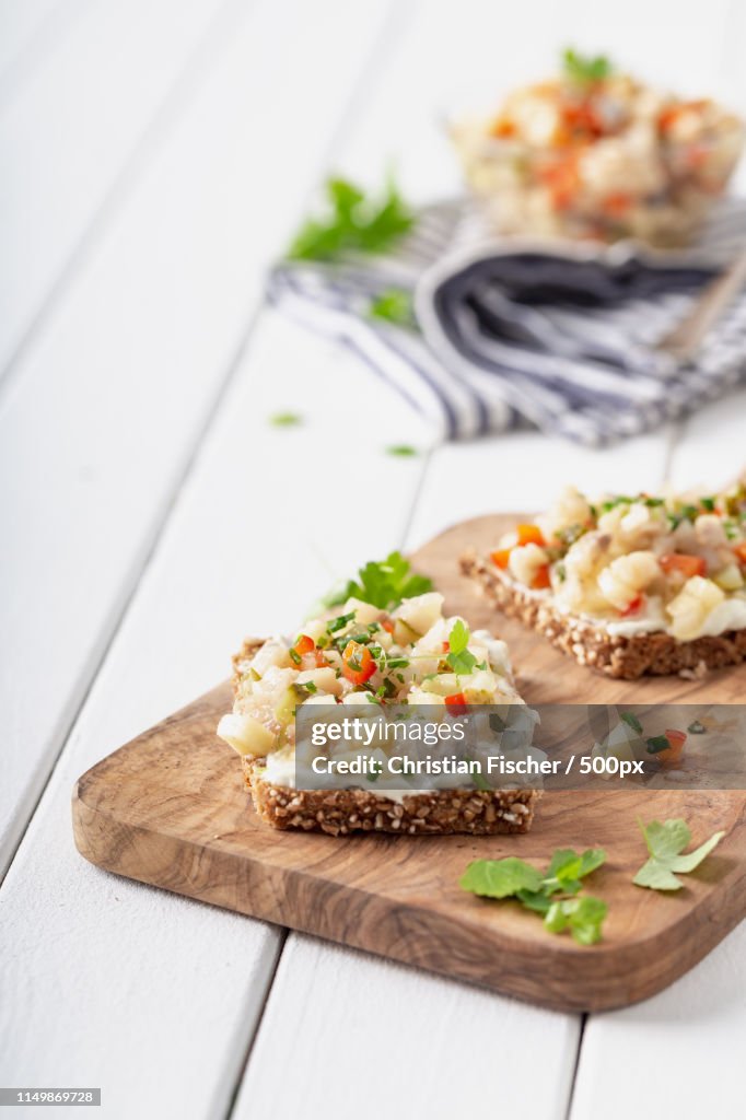 Homemade Herring Salad With Fresh Onions Apple And Herbs