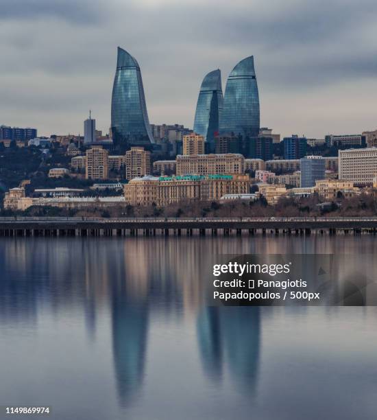 flame towers - baku during stock pictures, royalty-free photos & images