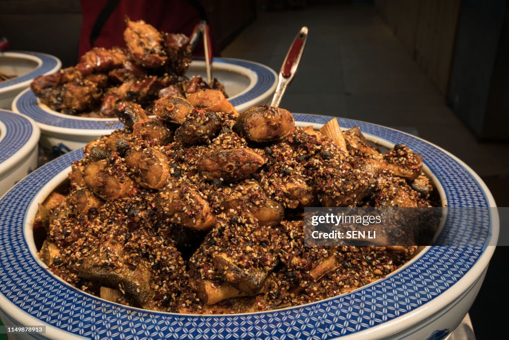 Street food in China: Hot Salted Fish, Wuhan, Hubu Street