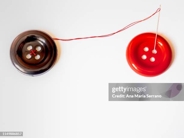 sewing and embroidery - threading stock pictures, royalty-free photos & images