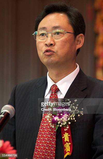 Xiong Weiping, chairman of Aluminum Corp.of China , speaks during a news conference in Beijing, China, on Wednesday, June 1, 2011. Rio Tinto Group,...
