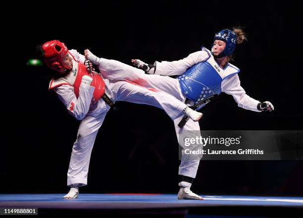 Jade Jones of Great Britain competes against Skylar Park of Canada in the Semi Final of the Women’s -57kg during Day 3 of the World Taekwondo...