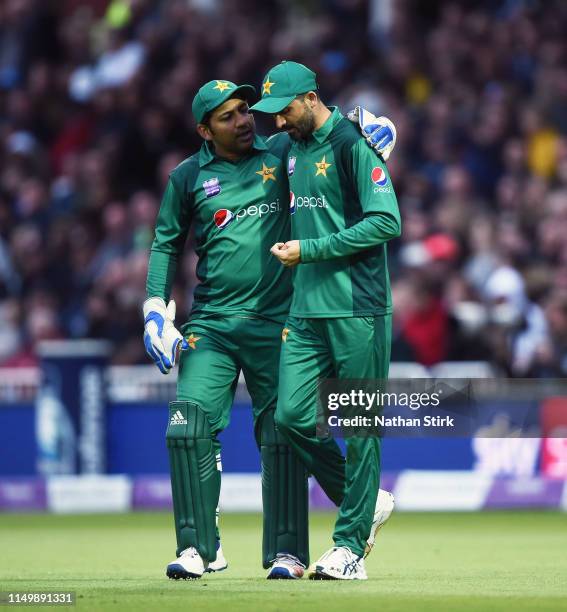 Sarfaraz Ahmed of Pakistan speaks to Junaid Khan after a miss field during the 4th Royal London ODI match between England and Pakistan at Trent...