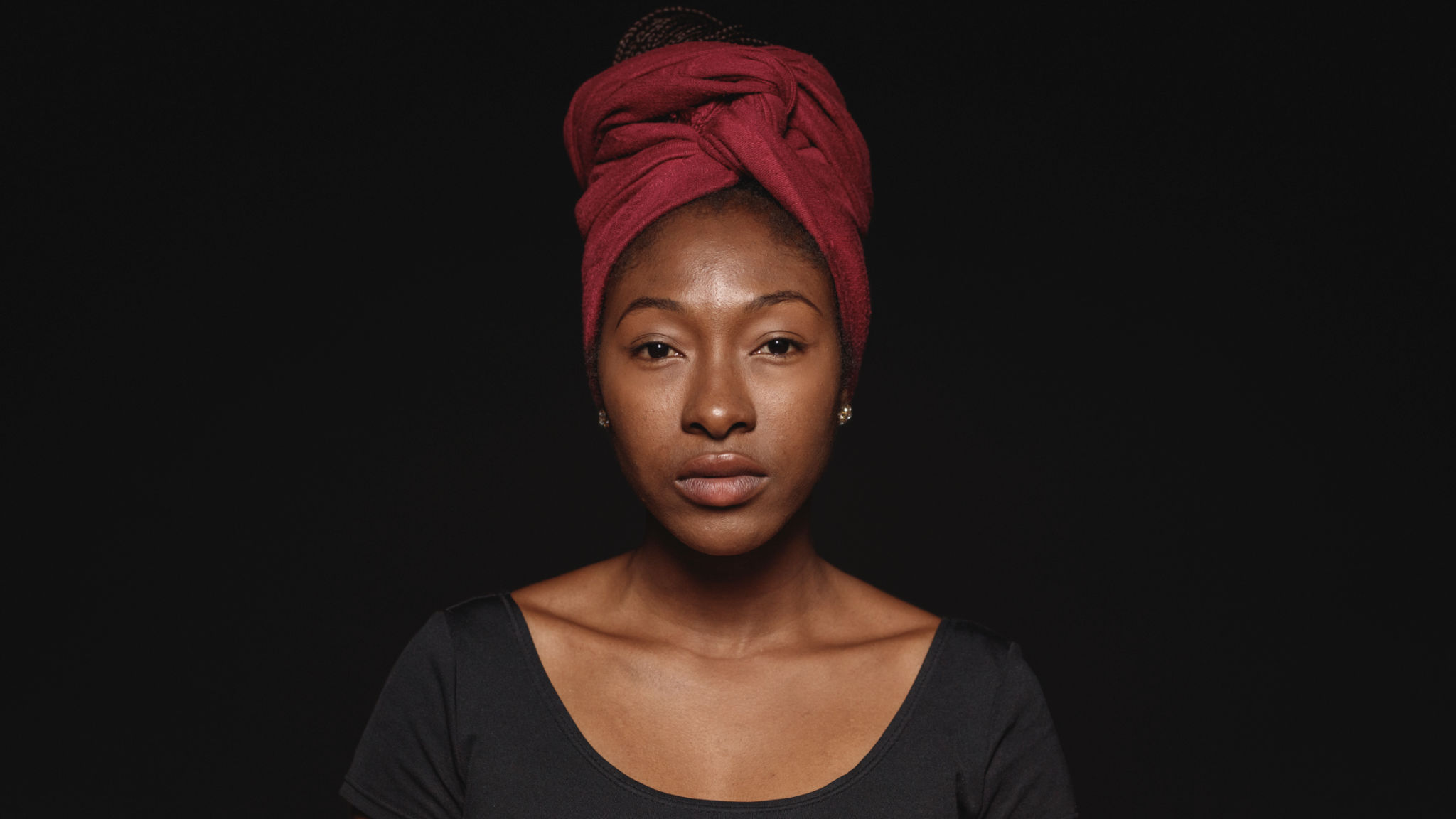 Portrait of an african woman in a headwrap Portrait of an african woman in a headwrap