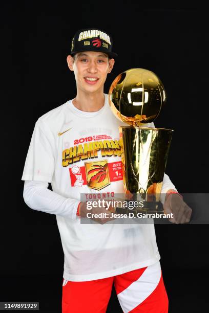 Jeremy Lin of the Toronto Raptors poses for a portrait with the Larry O'Brien Trophy after winning Game Six of the 2019 NBA Finals against the Golden...
