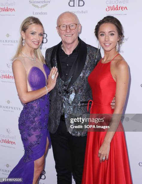 John Caudwell , Modesta Vzesniauskaite and Emily Andre attending the Butterfly Ball 2019 at Grosvenor House in London.