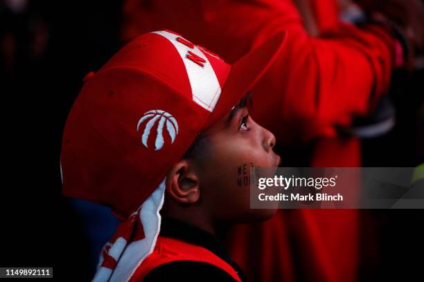 Toronto Raptors fans gather during Game Six of the NBA Finals between the Toronto Raptors and the Golden State Warriors at "Jurassic Park" on June...