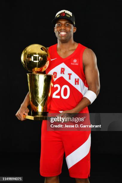 Jodie Meeks of the Toronto Raptors poses for a portrait with the Larry O'Brien Trophy after winning Game Six of the 2019 NBA Finals against the...