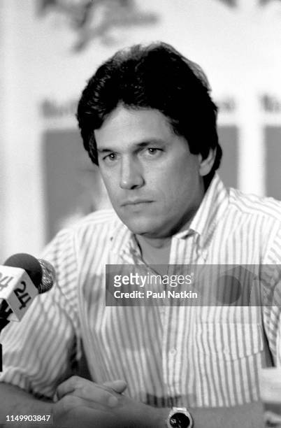 American Country musician George Strait sits behind a microphone during a press conference, Fresno, California, April 19, 1985.