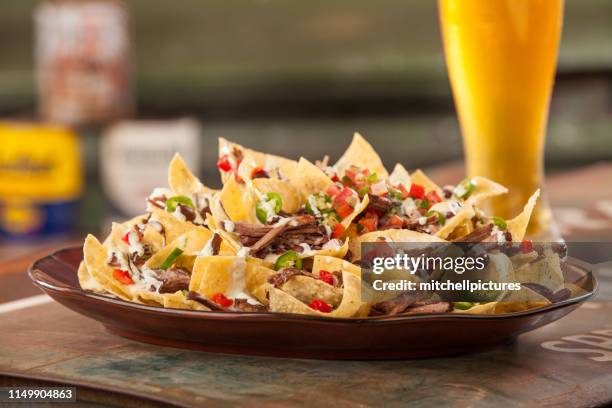 beef nachos and beer - nachos stock pictures, royalty-free photos & images