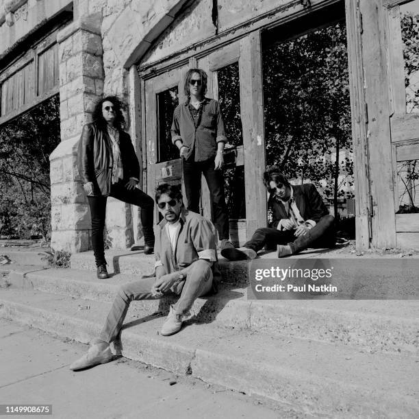 Portrait of American Rock group Izzy Stradlin and the Ju Ju Hounds, Chicago, Illinois, May 10, 1992. Pictured are, from left, Rick Richards, Charlie...
