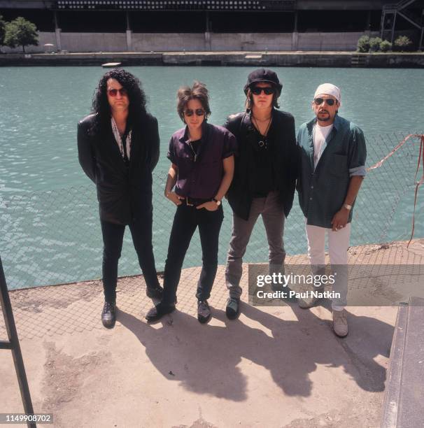 Portrait of American Rock group Izzy Stradlin and the Ju Ju Hounds on the bank of the Chicago River, Chicago, Illinois, May 10, 1992. Pictured are,...