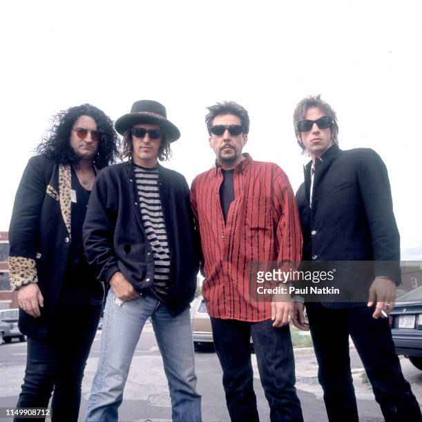 Portrait of American Rock group Izzy Stradlin and the Ju Ju Hounds on an unspecified street, Chicago, Illinois, May 10, 1992. Pictured are, from...