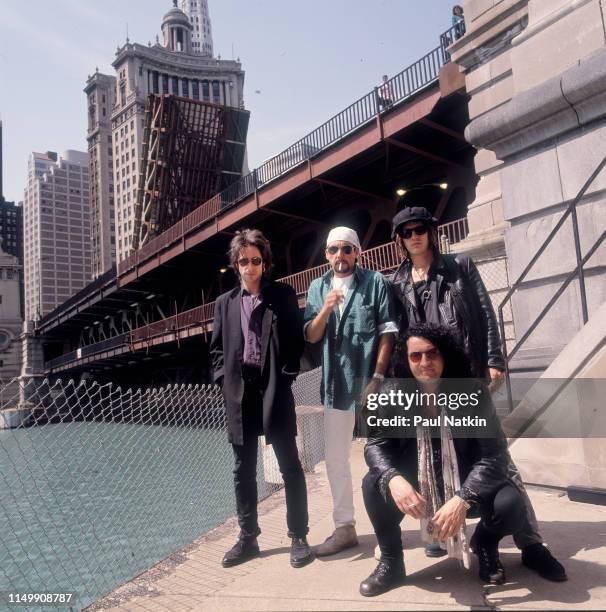 Portrait of American Rock group Izzy Stradlin and the Ju Ju Hounds beside the Chicago River , Chicago, Illinois, May 10, 1992. Pictured are, from...