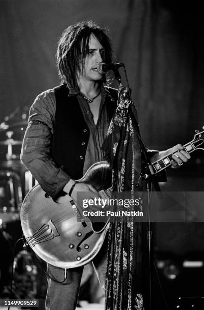 American Rock musician Izzy Stradlin plays guitar with his band, Izzy Stradlin and the Ju Ju Hounds, during a video shoot, Chicago, Illinois, May 15,...