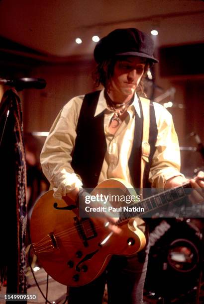 American Rock musician Izzy Stradlin plays guitar with his band, Izzy Stradlin and the Ju Ju Hounds, during a video shoot, Chicago, Illinois, May 15,...