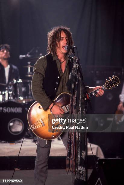 American Rock musician Izzy Stradlin plays guitar with his band, Izzy Stradlin and the Ju Ju Hounds, during a video shoot, Chicago, Illinois, May 15,...