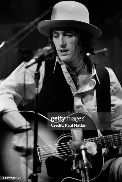 American Rock musician Izzy Stradlin plays guitar with his band, Izzy Stradlin and the Ju Ju Hounds, during a video shoot, Chicago, Illinois, May 15,...