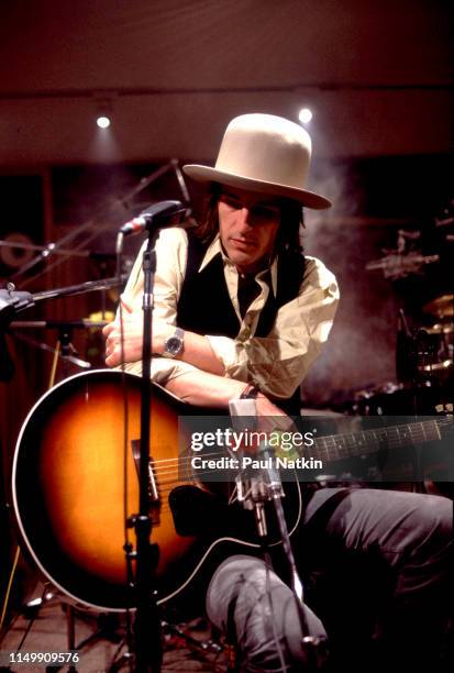 American Rock musician Izzy Stradlin plays guitar with his band, Izzy Stradlin and the Ju Ju Hounds, during a video shoot, Chicago, Illinois, May 15,...