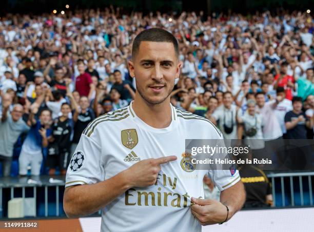 Eden Hazard of Real Madrid poses during his official presentation at Santiago Bernabeu stadium on June 12, 2019 in Madrid, Spain.