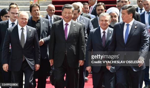 Russian President Vladimir Putin, Pakistani Prime Minister Imran Khan, Chinese President Xi Jinping, Uzbek President Shavkat Mirziyoyev, Iran's...