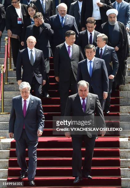 Pakistani Prime Minister Imran Khan, Belarus' President Alexander Lukashenko, Iran's President Hassan Rouhani, Russian President Vladimir Putin,...