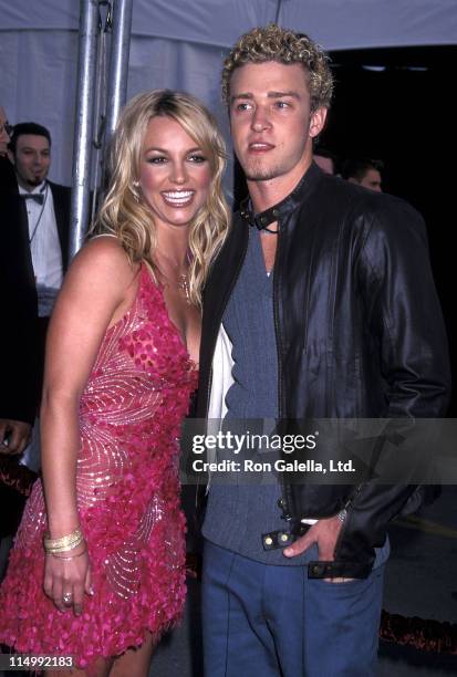 Singer Britney Spears and singer Justin Timberlake of N'Sync attend the 29th Annual American Music Awards on January 9, 2002 at Shrine Auditorium in...