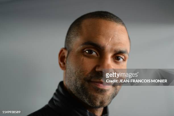 Former San Antonio Spurs basketball player Tony Parker, who has announced his retirement to launch a company called "9-PROM", poses for a photograph...